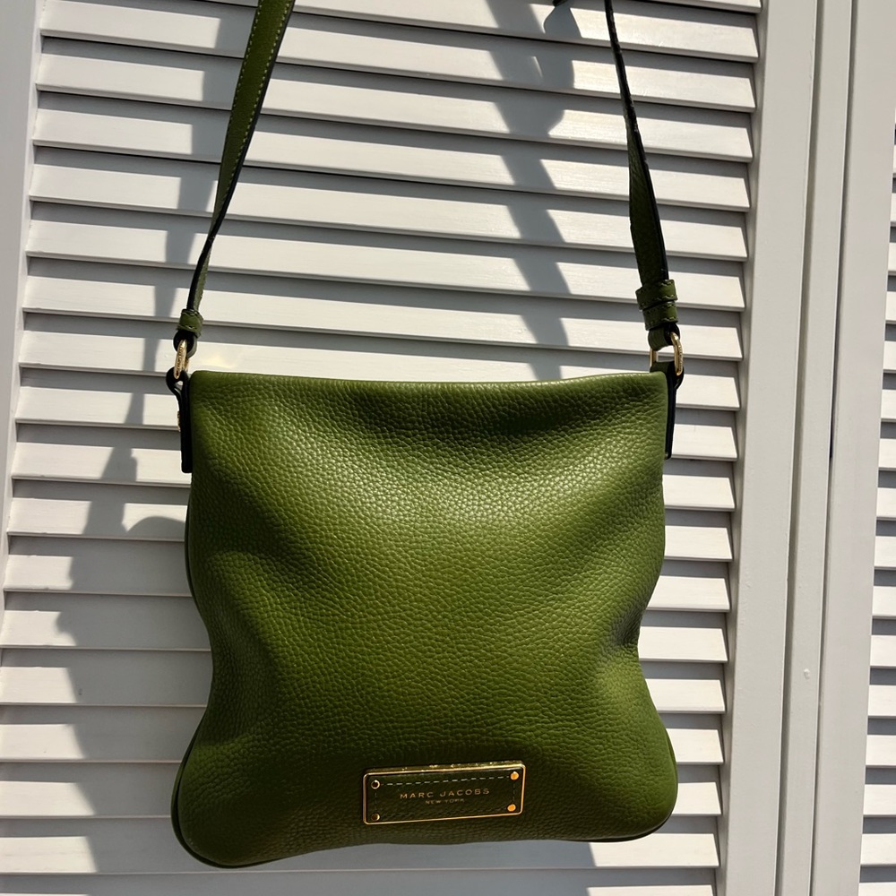Marc Jacobs olive green crossbody. New! Never worn. Pictures show imperfections